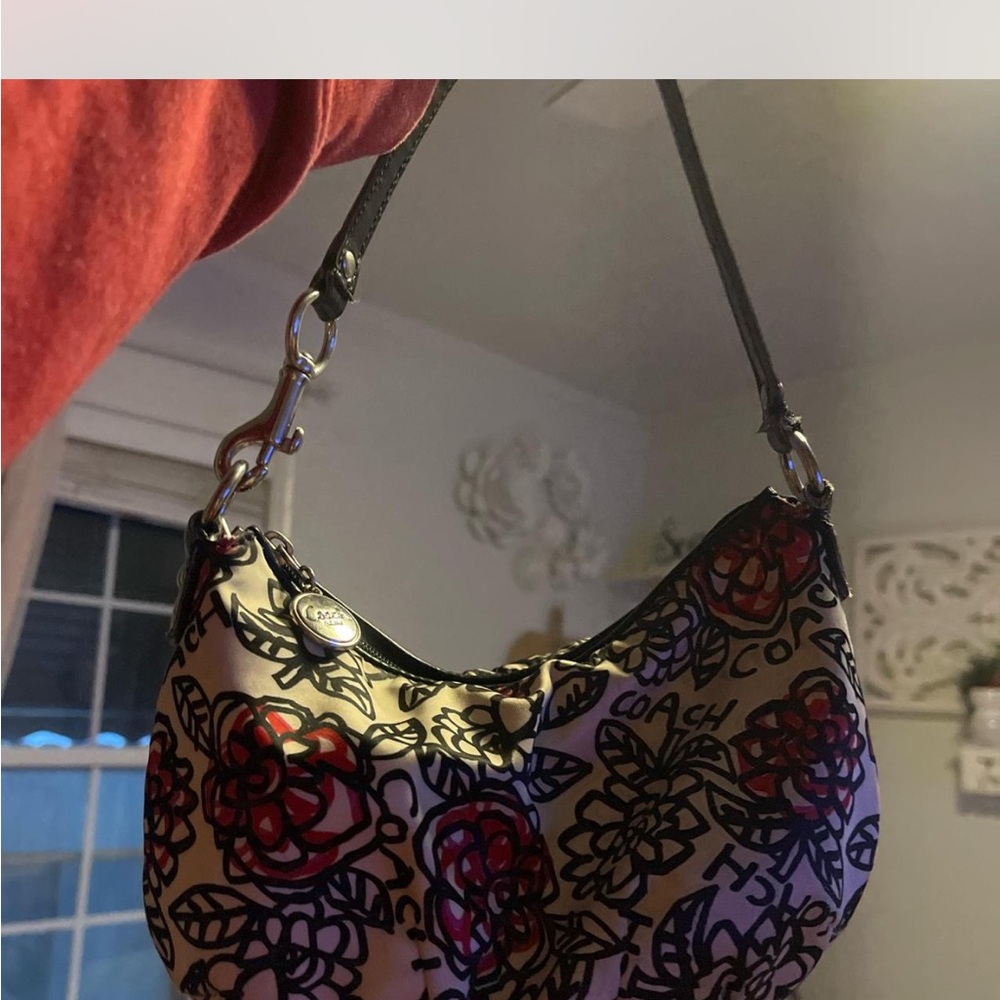 Coach Shoulder Bag in Black and Red with Intricate Floral Design